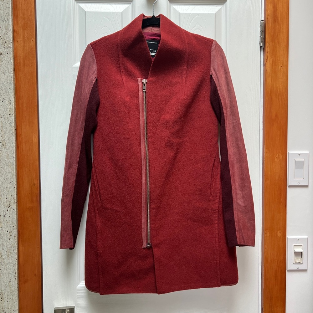In high end Japanese brand  xxs wool and goat leather jacket